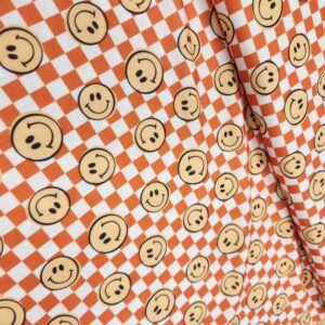 Orange Happy Faces Swim Fabric